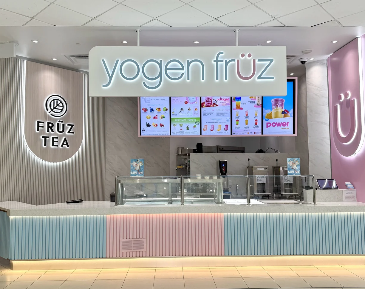 The counter of the Yogen Früz store at Promenade Mall, with menu screens and a Früz Tea sign