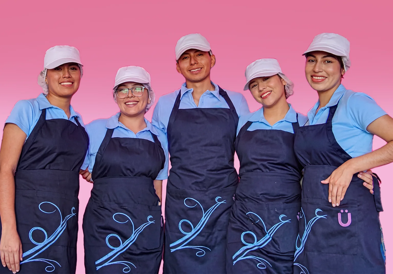 Five Yogen Früz crew members in uniform, standing together and smiling