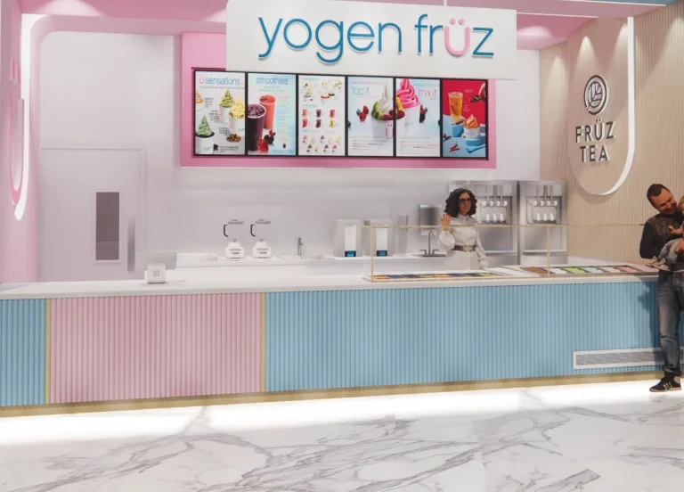 Yogen Früz counter with a team member serving customers
