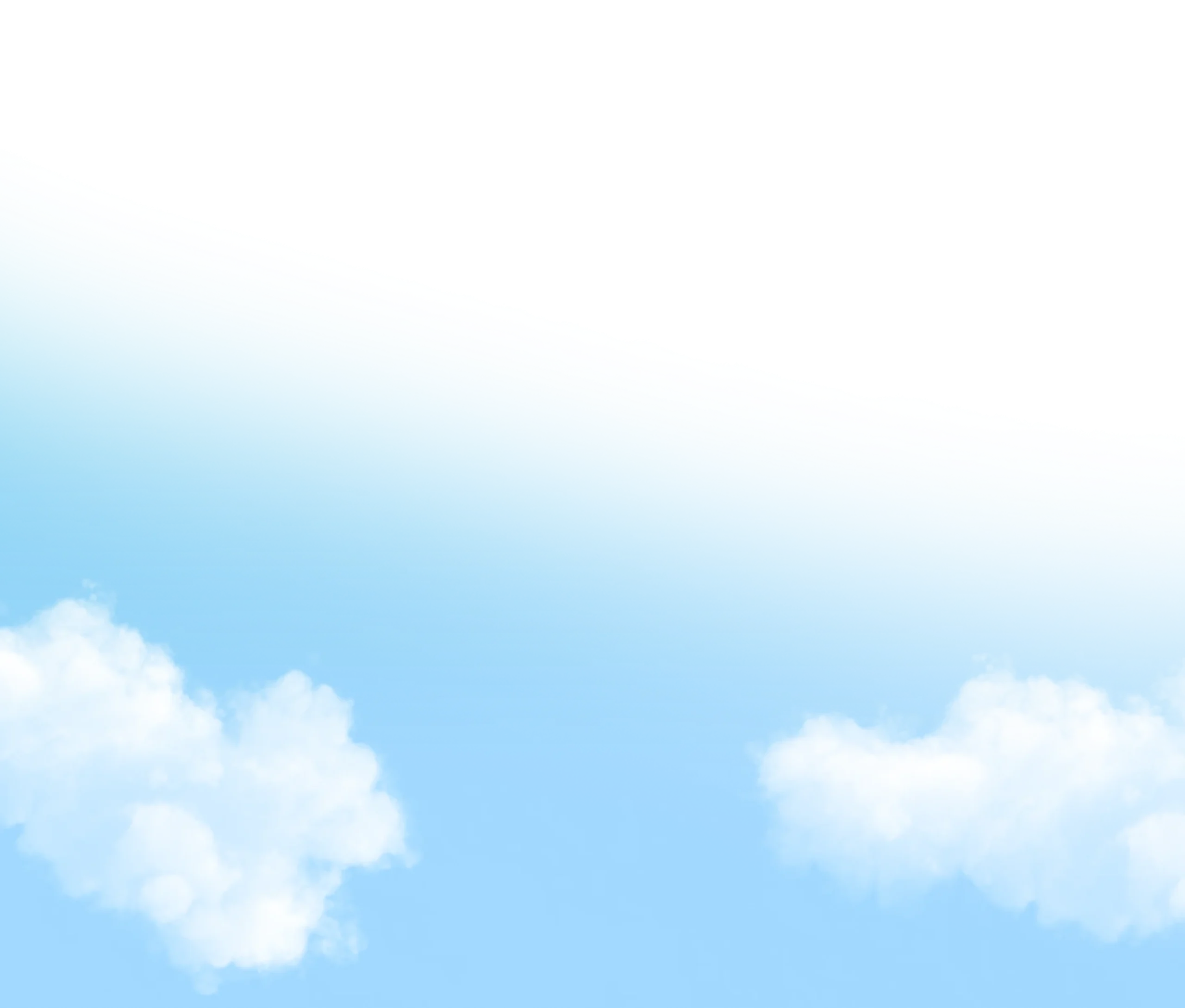 A blue sky with soft clouds