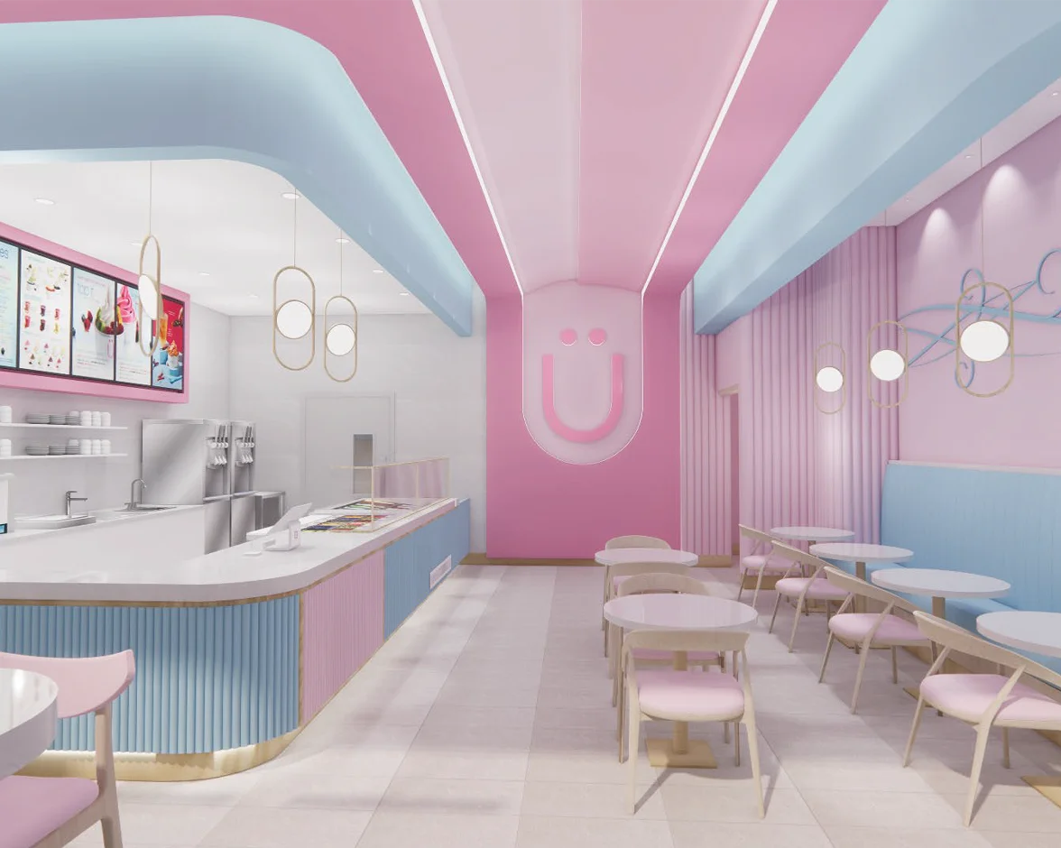 Yogen Früz storefront interior with a pink and blue service counter, menu screens and cafe seating